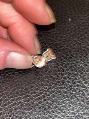 Pair of studio crafted hand faceted round cut golden rutilated quartz gems